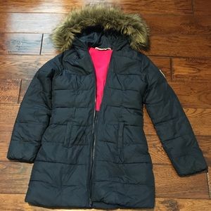 Girl’s long puffer coat.